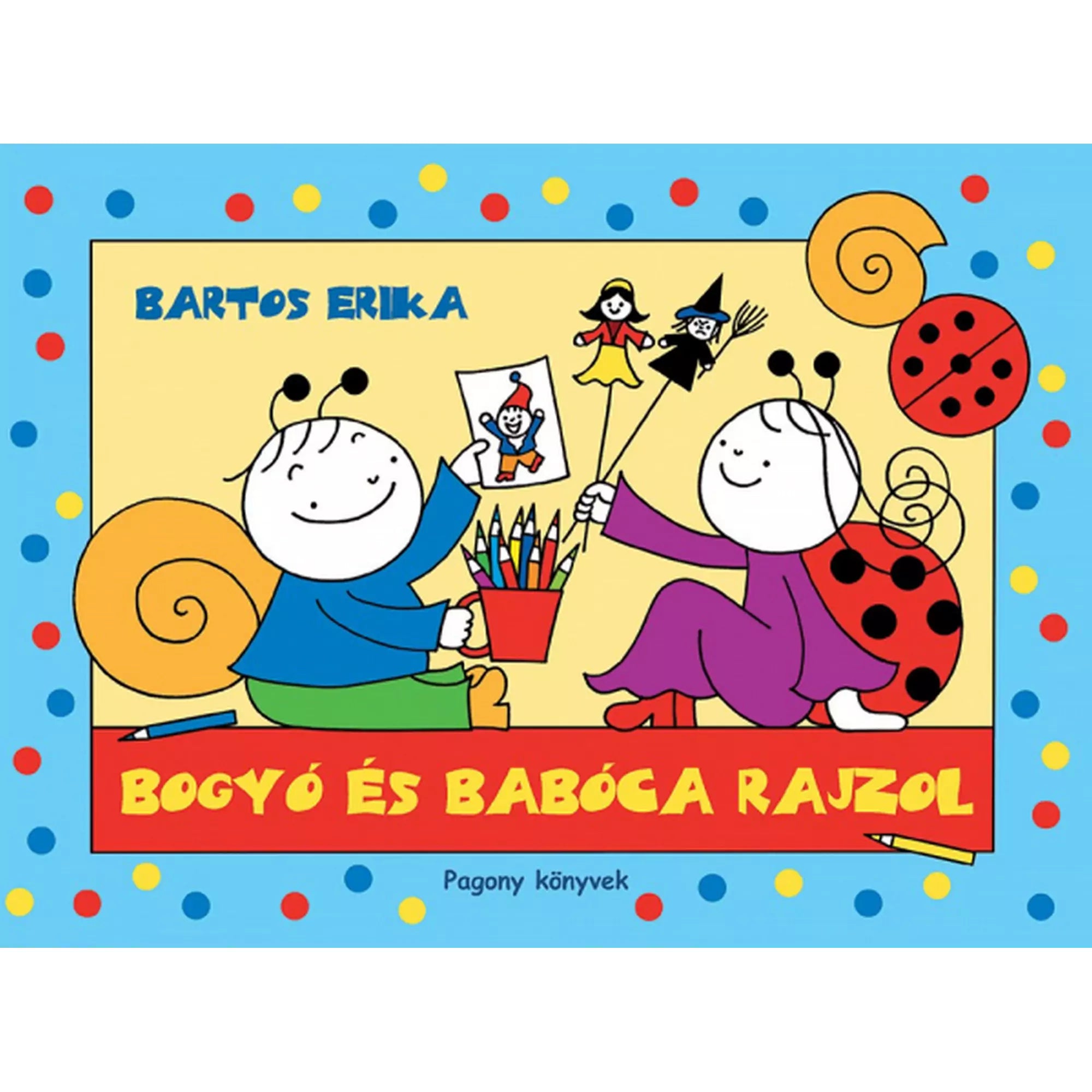 Bogyó és Babóca rajzol – Bartos Erika mesekönyvének borítója vidám, pöttyös kék keretben, Bogyó színes ceruzákkal rajzol, Babóca bábokat tart a kezében.