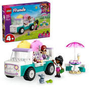 A LEGO Friends Heartlake City Fagyis furgon 42644 építőkészlet képe, amelyen Paisley és Elsa D. figurái láthatók a fagyis furgon mellett, nyuszi figura, fagylaltos kiegészítők, pénztárgép, napernyő és asztal két székkel a játékélmény kiegészítésére.