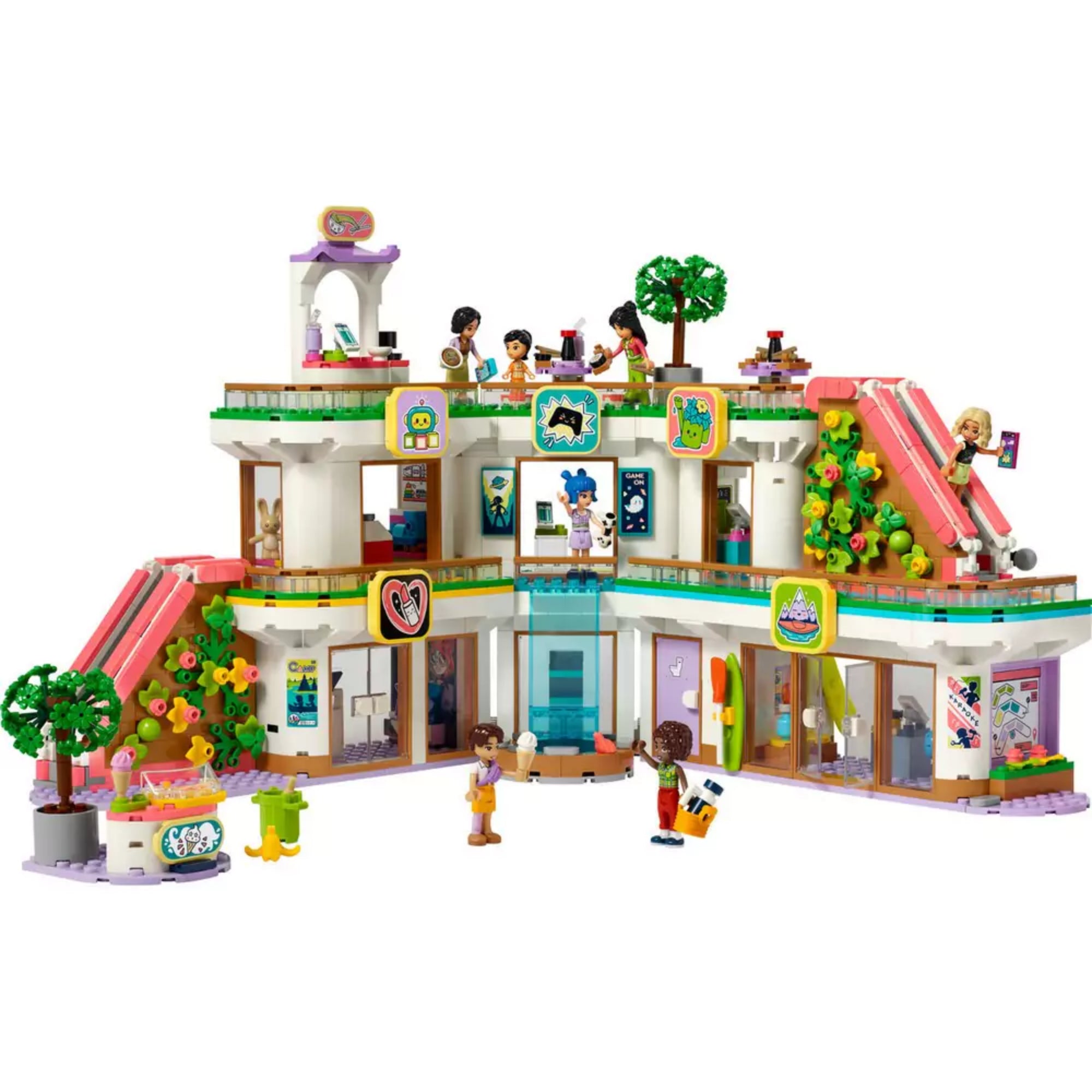 LEGO Friends Heartlake City bevásárlóközpont (42604) teljes, 3 szintes építménye nyitott állapotban, többféle bolt és szórakoztató helyszín, mint például divatüzlet, játékbolt, sportrészleg és kávézó, 7 minifigurával és sok kiegészítővel.