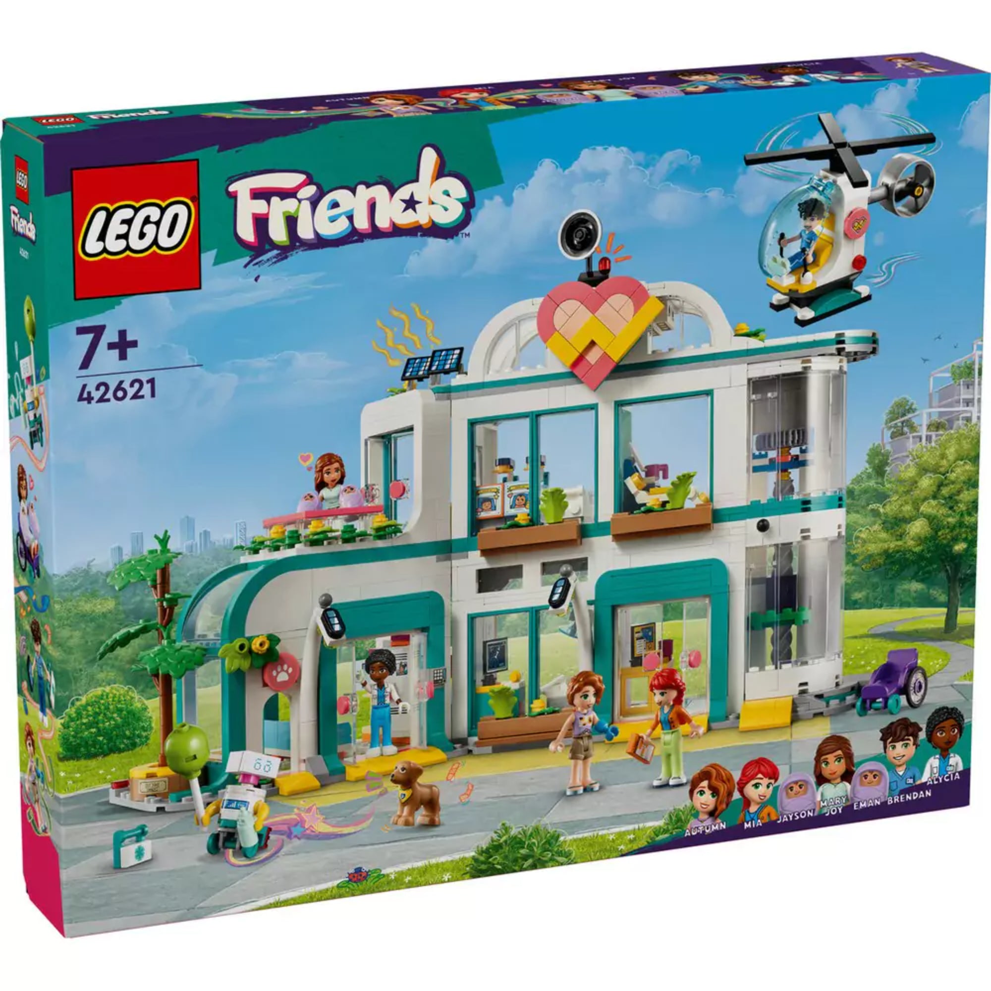 A LEGO Friends Heartlake City Kórház (42621) színes doboza a készlet tartalmával, karakterekkel és a város háttérrel.