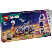 A LEGO Friends Mars űrállomás és űrrakéta (42605) doboza, amely látványosan ábrázolja a marsi tájat, az űrállomást, a rakétát és a karaktereket. A doboz jobb alsó sarkában Olivia, Aveline és Julian karakterportréja látható. A csomagolás a 8+ korosztály számára ajánlott.