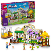 LEGO Friends: Botanikus kávéház és virágbolt (42671) doboz és megépített modell egy képen, minifigurákkal és kreatív, virágos jelenettel.