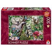 „Puzzle Schmidt: Cuki koalacsalád – 500 darabos kirakó doboza, élénk zöld dzsungel háttérrel és bájos koalákkal.”