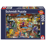 „Puzzle Schmidt, Garázsvásár, 500 darabos – a doboz képe színes, részletgazdag garázsvásár illusztrációval és prémium minőség megjelöléssel.”
