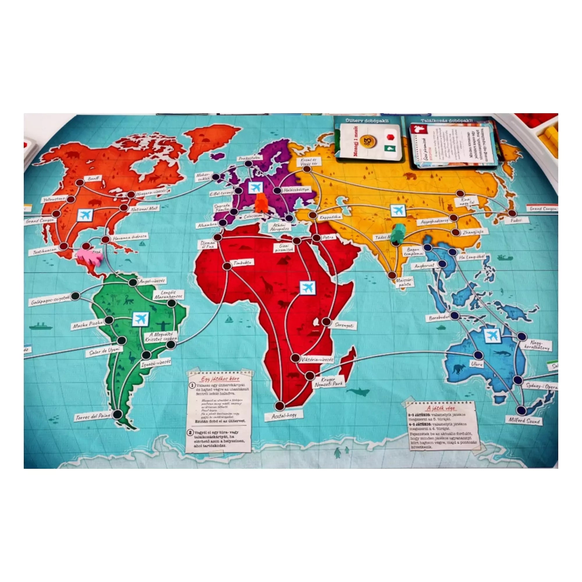 Az Utazás a Föld körül társasjáték nagyméretű világtérképe, kontinensekkel, ikonikus helyszínekkel és kijelölt utazási útvonalakkal.