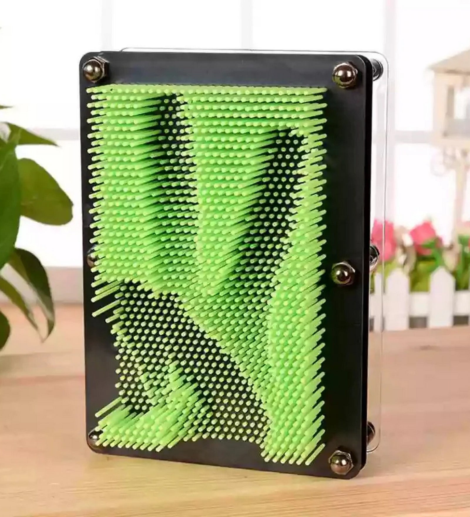3D Pin Art képkirakó: Zöld 12,5 cm tűs képalkotó játék, domború mintát formázó tüskékkel.
