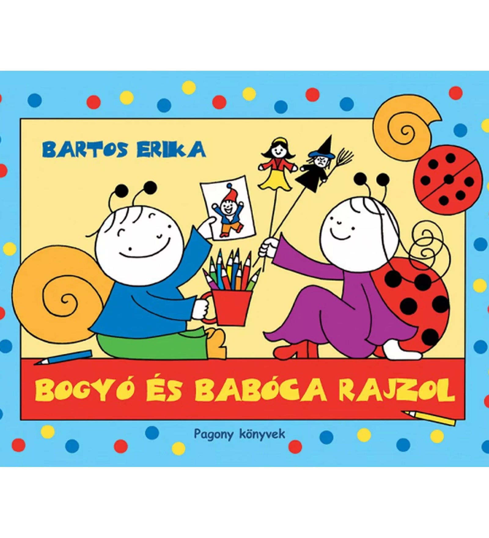 Bogyó és Babóca rajzol – Bartos Erika mesekönyvének borítója vidám, pöttyös kék keretben, Bogyó színes ceruzákkal rajzol, Babóca bábokat tart a kezében.