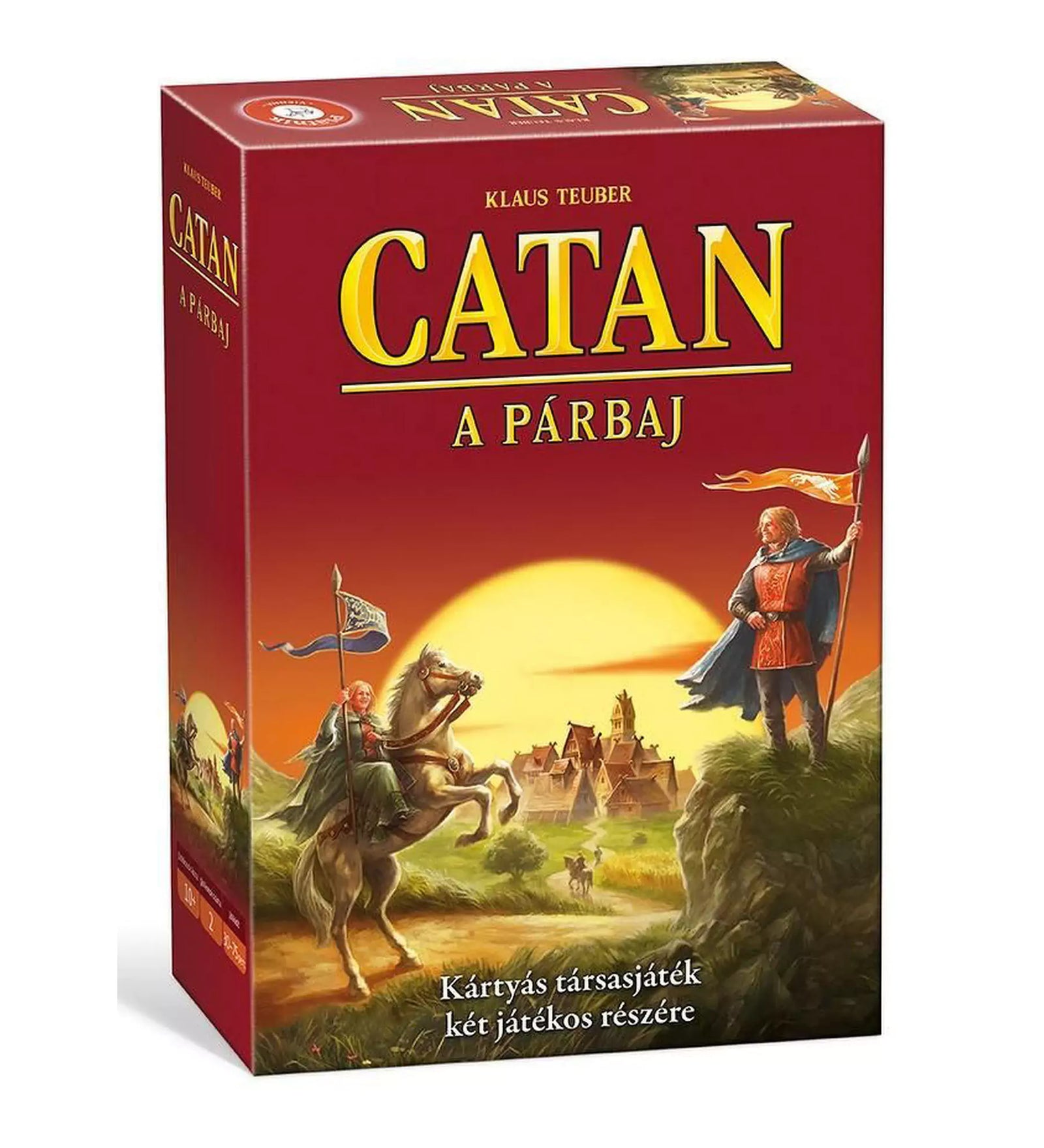 A képen a "Catan: A párbaj" kártyajáték vörös doboza látható. A doboz borítóján két lovag látható, akik egy gyönyörű táj előtt, a naplementében, küzdenek a Catan szigetén. A dobozon a játék címe sárga nyomtatott betükkel van feltüntetve.
