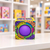 Cool Mix stresszlabda (lila) – lila stresszlevezető labda színes Cool Mix Toy Antistress dobozban, üzleti környezetben.