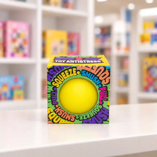 Cool Mix stresszlabda (sárga) – sárga stresszlevezető labda színes Cool Mix Toy Antistress dobozban, üzleti környezetben.