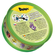 A Dobble Zoo kör alakú fém doboza, állatos szimbólumokkal és játékleírással.
