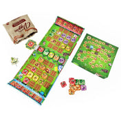 A Garden Rush társasjáték teljes játékképe az asztalon: hosszú játéktábla mezőkkel, pontozótábla, zöldséglapkák és zsák az alkatrészekkel.