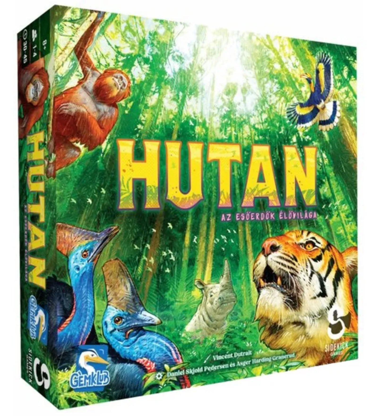 A Hutan – Az esőerdők élővilága társasjáték doboza színes, részletgazdag grafikával, amelyen különféle esőerdei állatok – tigris, orángután, kazuár – láthatók.