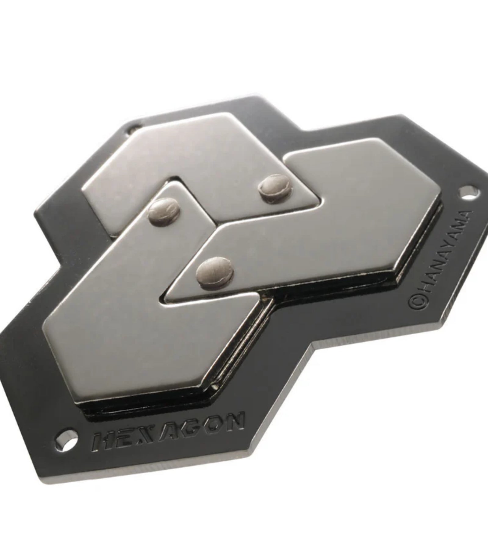 Fémes színű, hatszög alakú Huzzle Cast HEXAGON logikai kirakó összeillesztve, letisztult, modern megjelenéssel.