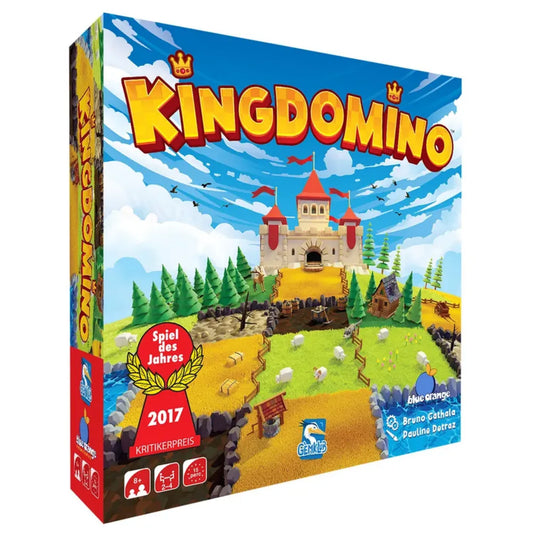 A Kingdomino társasjáték doboza – vidám, mesés illusztráció várkastéllyal, mezőkkel és a 2017-es „Spiel des Jahres” díj emblémájával.