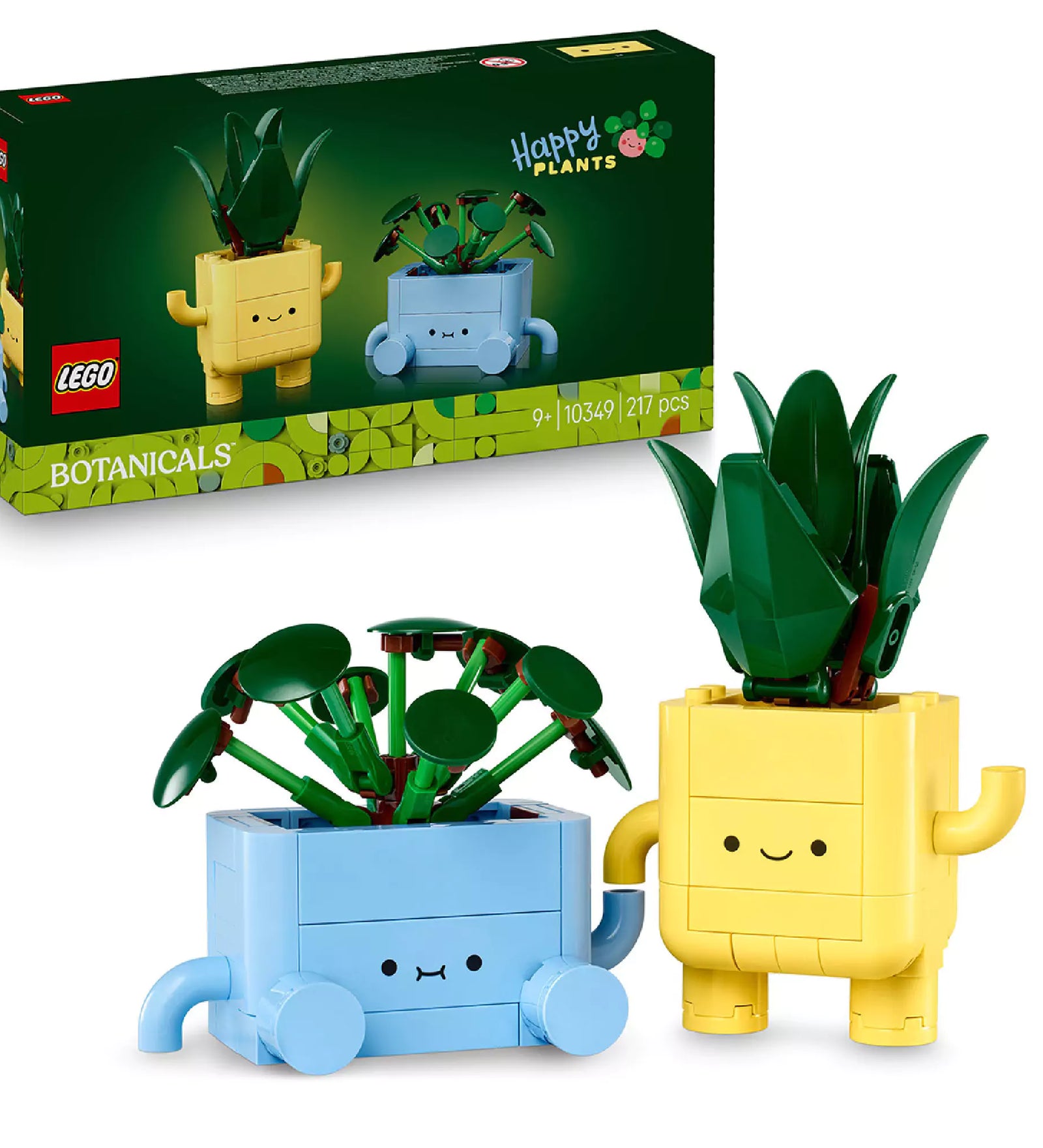 A LEGO Happy Plants (10349) megépített figurái dobozzal együtt: a sárga cserép vastag levelű növénnyel, a kék cserép pedig kis zöld levelekkel.