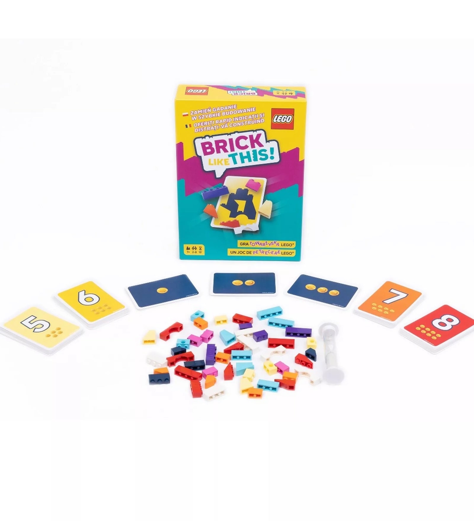 A LEGO Brick Like This! társasjáték doboza a játék elemeivel: különböző színű LEGO elemek, számkártyák és homokóra.