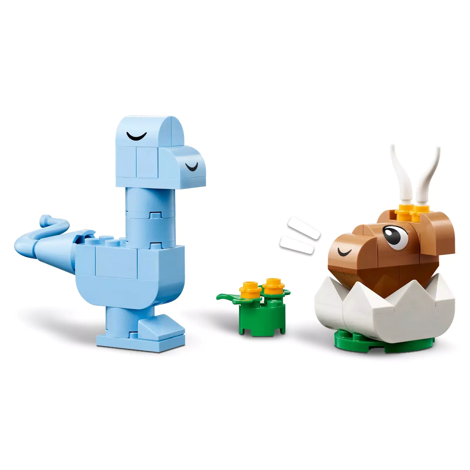 Egy kék és egy tojásból kikelt barna dinoszaurusz figura az "LEGO Classic Kreatív dinoszauruszok (11041)" készletből.