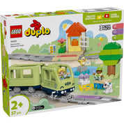 Dobozkép a LEGO DUPLO 10427 Interaktív kalandvonat szettről, amely egy zöld színű, fény- és hanghatással ellátott vonatot, síneket, állatfigurát, két DUPLO figurát és egy kis házikót ábrázol.