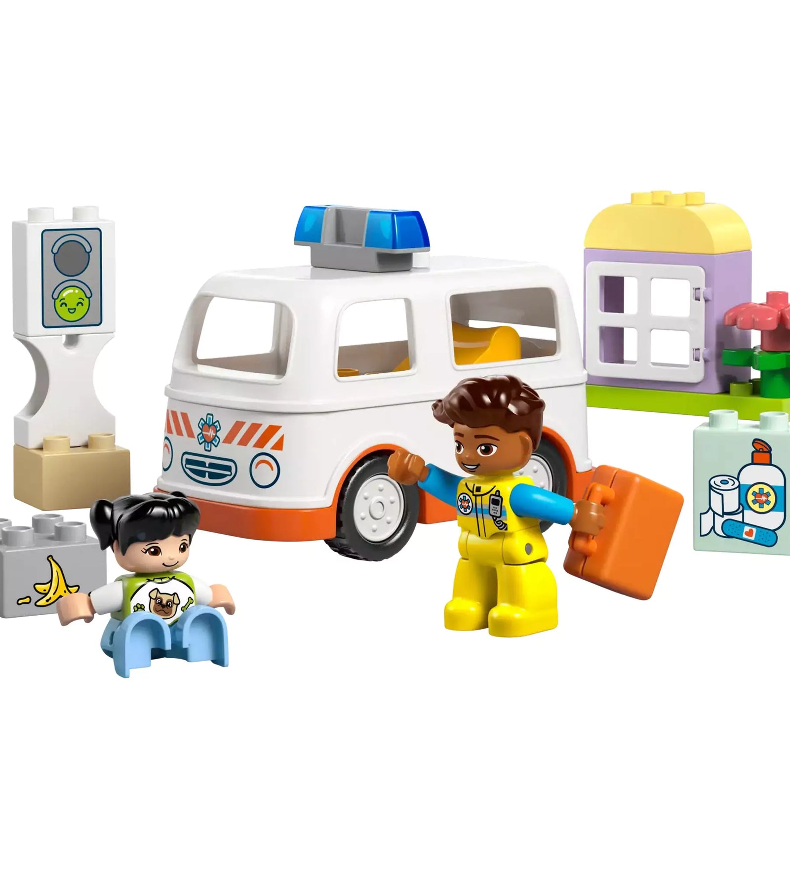 A LEGO Duplo Mentőautó és mentősofőr (10447) készlet teljes tartalma, kiemelve a mentőautót, figurákat és építőkockákat.