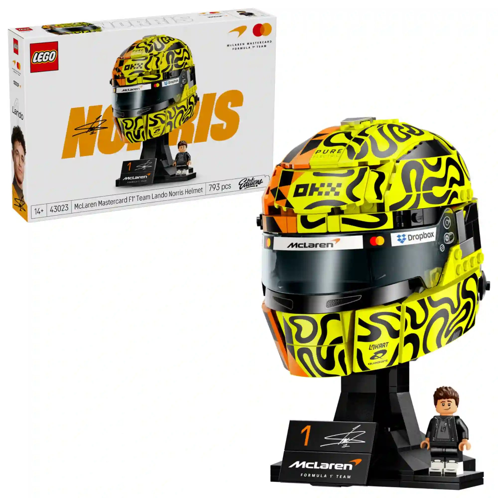 LEGO McLaren Mastercard F1 Team Lando Norris Helmet (43023) megépített sisakmodell és termékdoboz egy képen, a gyűjtői kiállításra szánt McLaren F1 relikviával és Lando Norris minifigurájával.