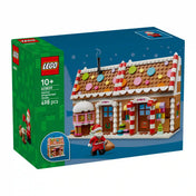 LEGO 40809 Ünnepi mézeskalács ház – A készlet dobozának eleje látható, rajta a havas, színes cukorkákkal díszített mézeskalács házzal és a Mikulás figurával.