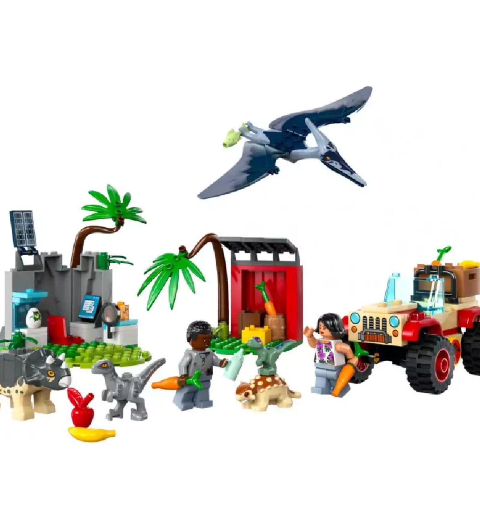 A LEGO Jurassic World Kis dinók mentőközpont (76963) teljes készlete: két minifigura (Darius és Sammy), különféle bébi dinoszaurusz figurák, terepjáró, mentőállomás, pálmafák, gyümölcsök és zöldségek, valamint egy Pteranodon figura a levegőben.
