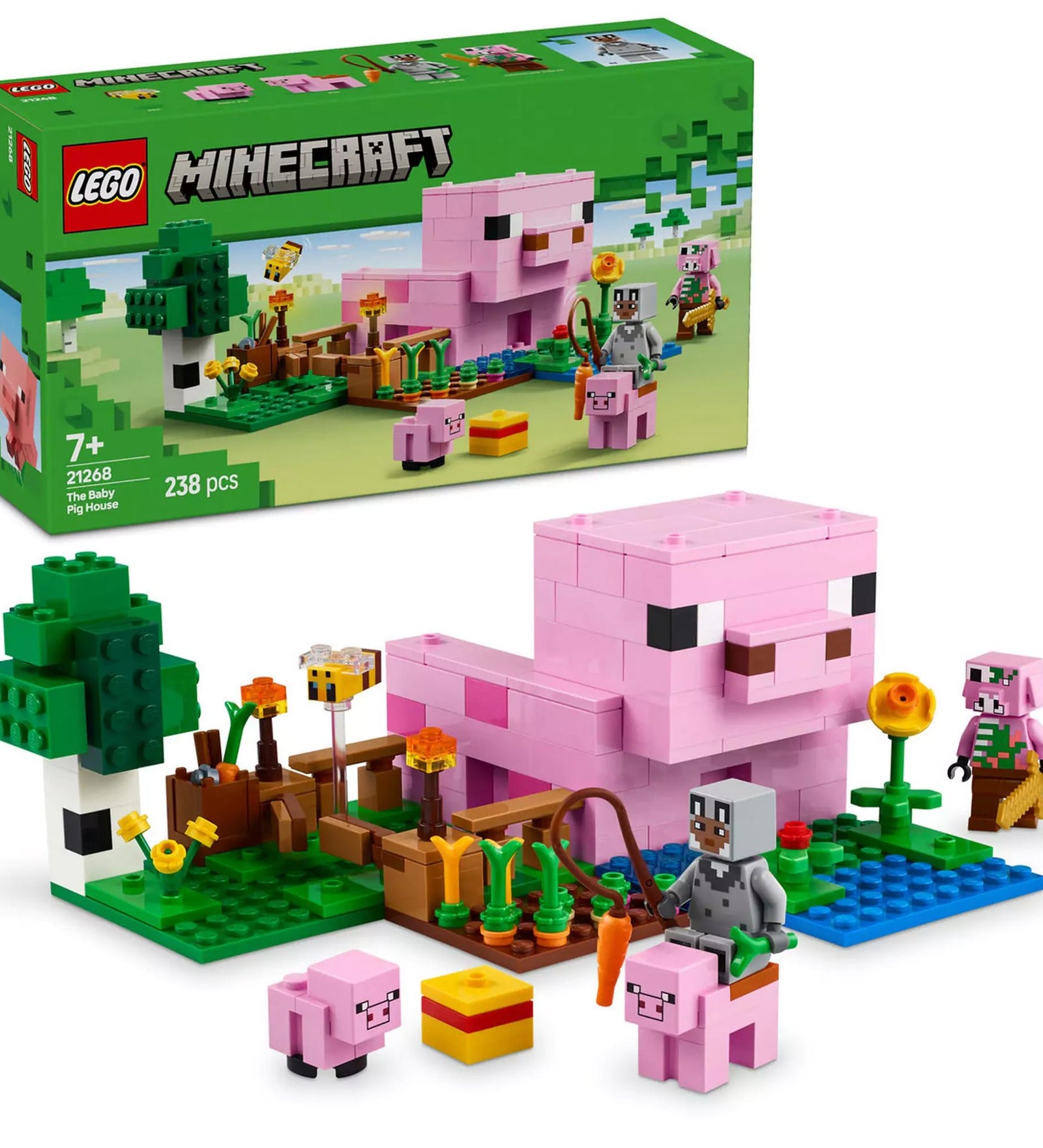A LEGO Minecraft „Malacházikó” készlet (21268) teljesen megépítve, amely egy nagy, rózsaszín malac alakú házat, egy kertet répákkal, virágokkal és méhekkel ábrázol, valamint Minecraft karaktereket, köztük egy kismalacot, egy Alex minifigurát és egy creepert.