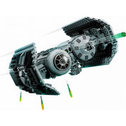 A LEGO Star Wars TIE bombázó (75347) repülés közben, kilőtt zöld lézerek és leeső sárga bombák láthatók a háttérben, realisztikus mozgást imitáló elmosódott effektusokkal.