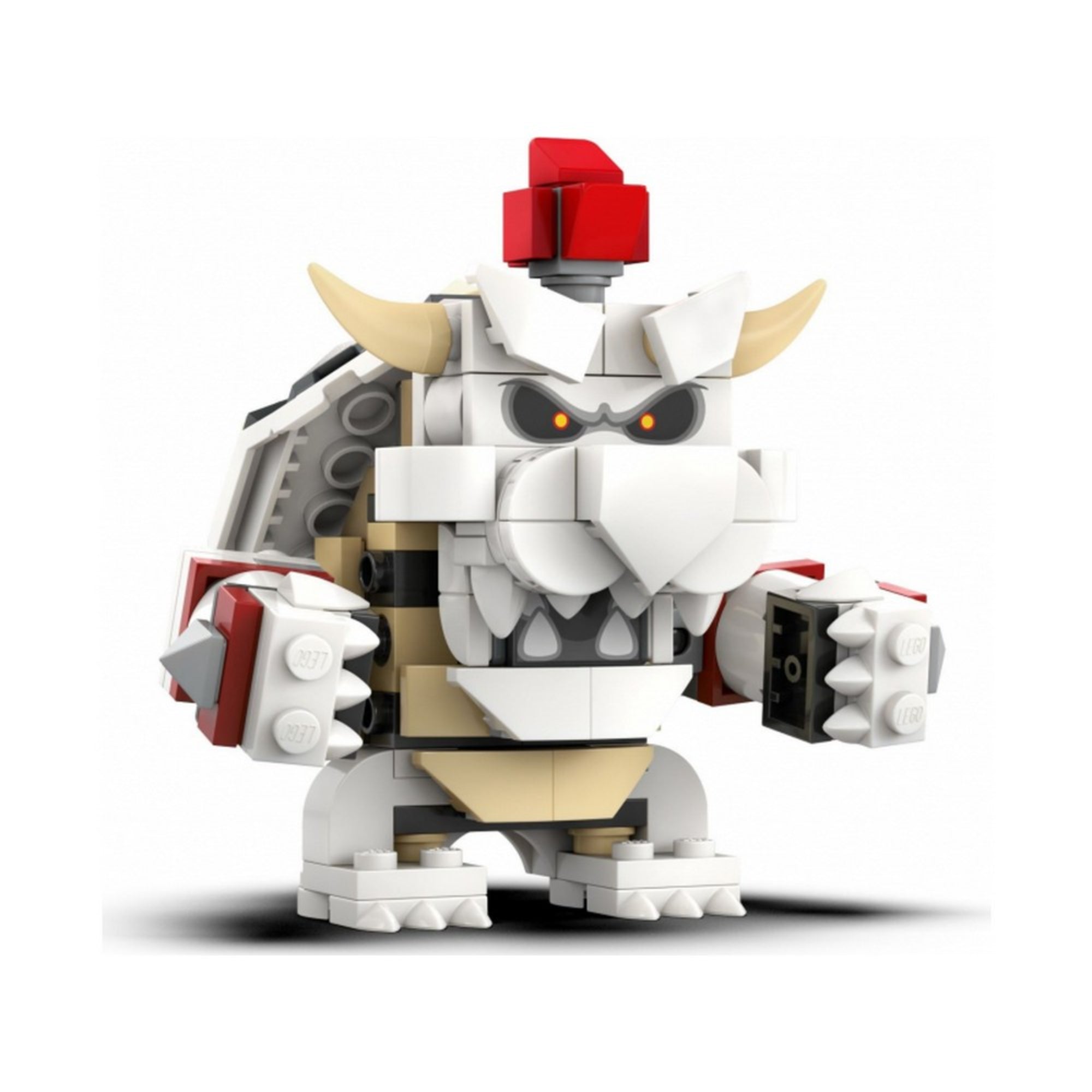 A képen a LEGO Super Mario univerzumából ismert Dry Bowser figura látható közelről, teljes pompájában. Ez a hátborzongató, csontvázszerű karakter a klasszikus Bowser sötétebb, halott verziója, akit fehér és bézs LEGO-elemekből építettek meg.