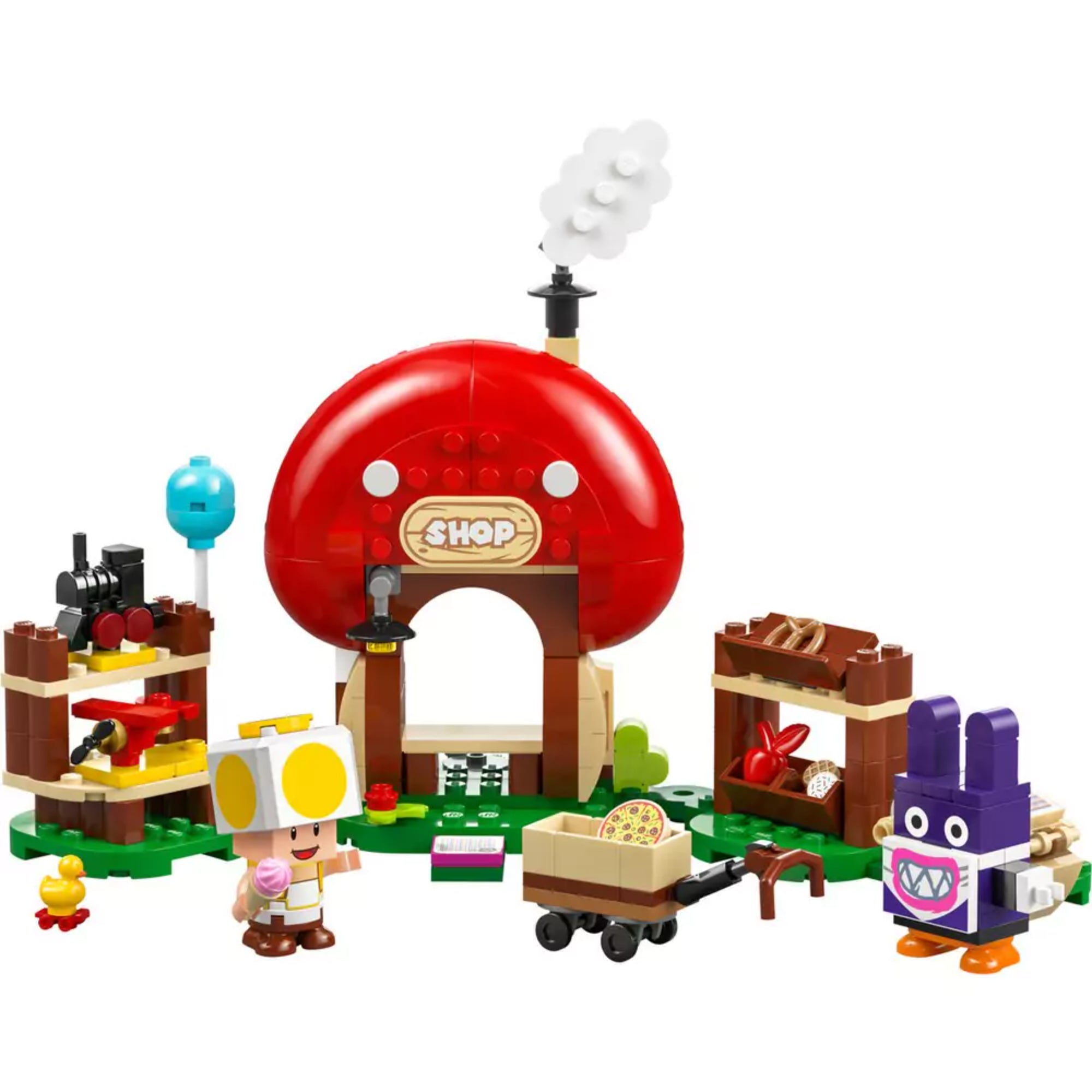 LEGO Super Mario Nabbit Toad boltjánál kiegészítő szett összerakva: gombaalakú boltépület piros tetővel, polcokon játékokkal és élelmiszerekkel, Toad sárga sapkában fagylalttal, Nabbit lila nyuszifiguraként, egy kocsiban pizzával és gyümölcsökkel.