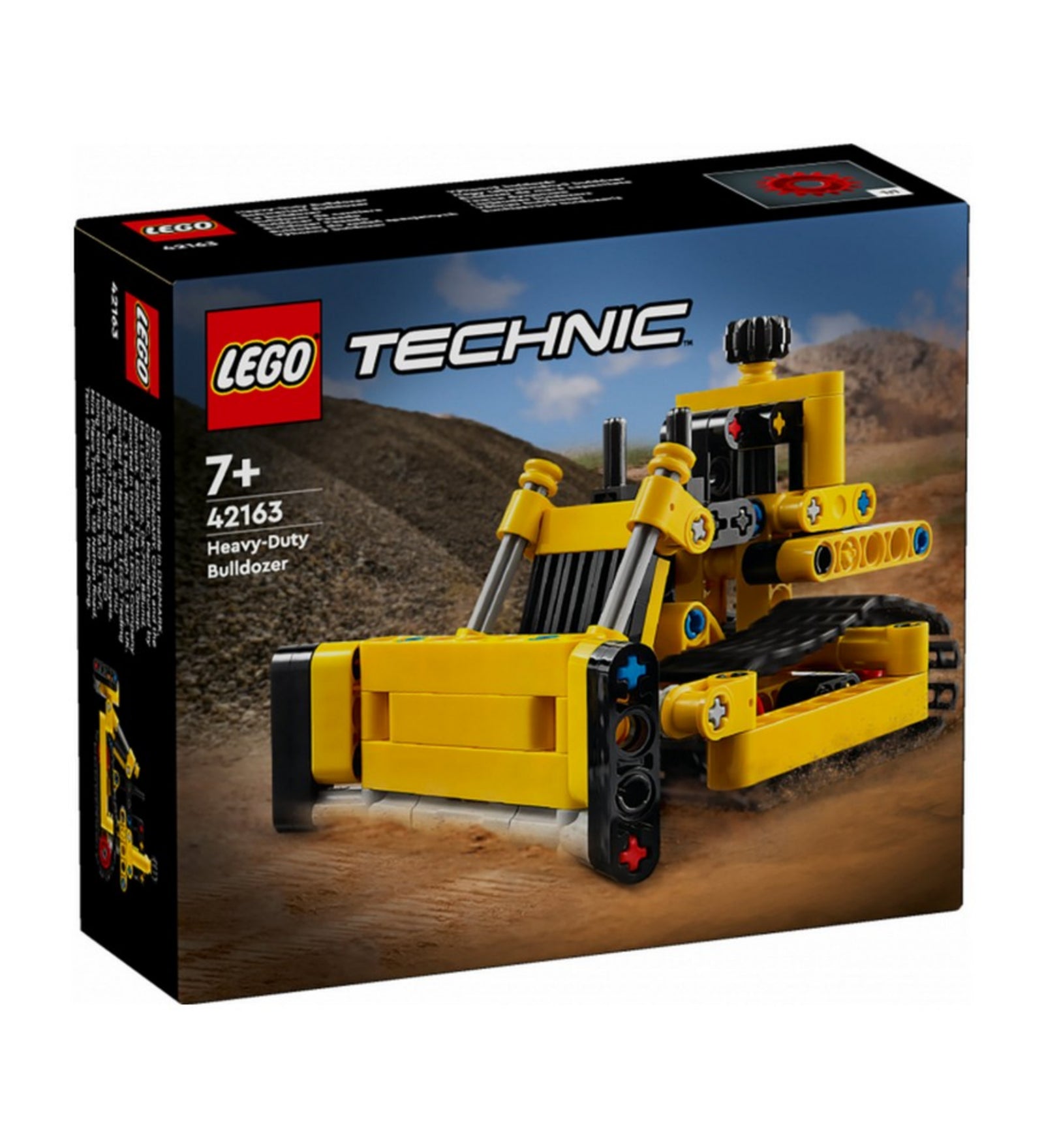 LEGO Technic Nagy teljesítményű buldózer 42163 doboza, dombos háttérrel, amely kiemeli a modell markáns ipari megjelenését és a 7+ korosztálynak szóló ajánlást.