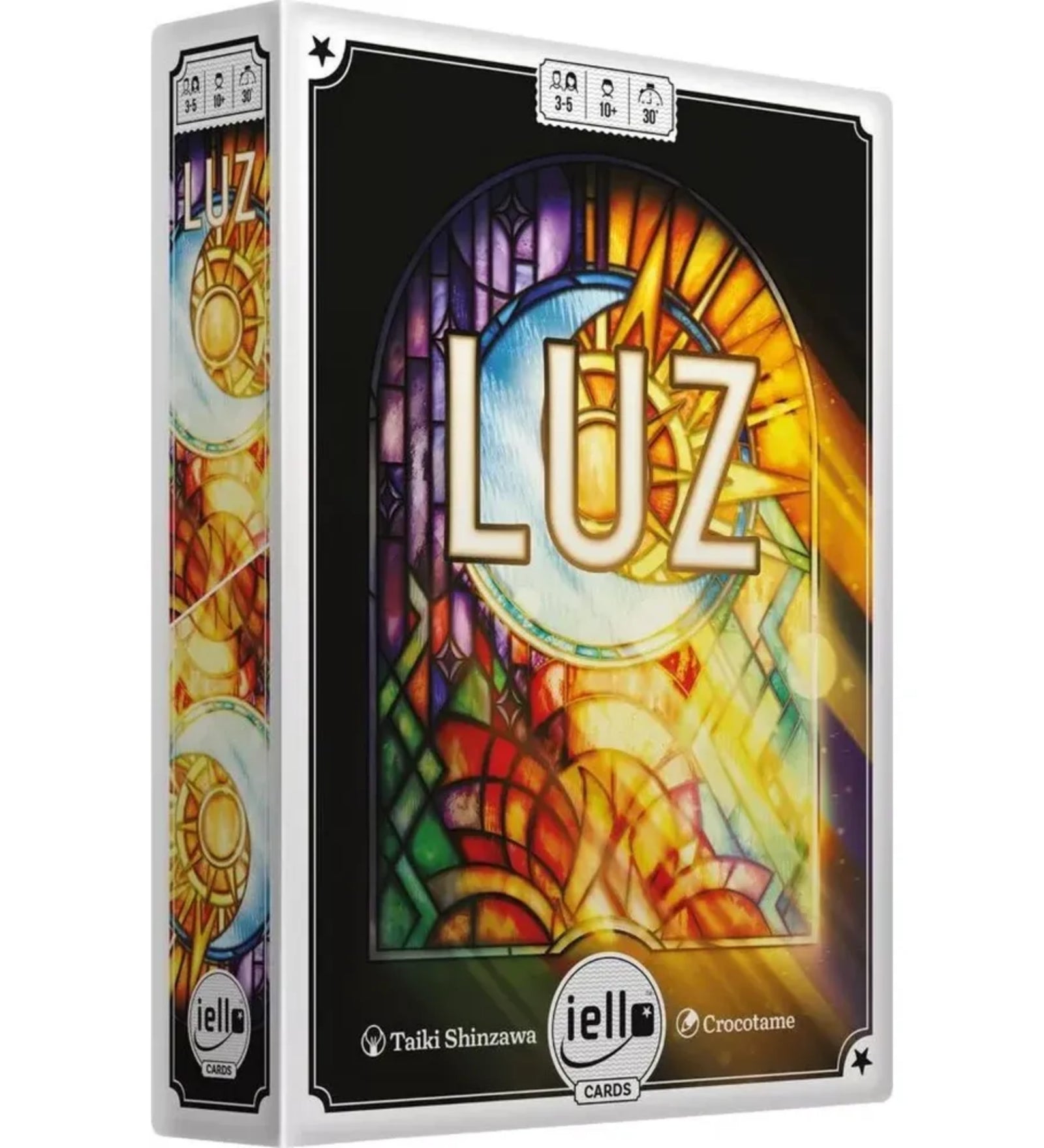 LUZ magyar nyelvű társasjáték doboza látványos, színes katedrális ólomüveg ablak grafikával és aranyfényű dizájnnal.