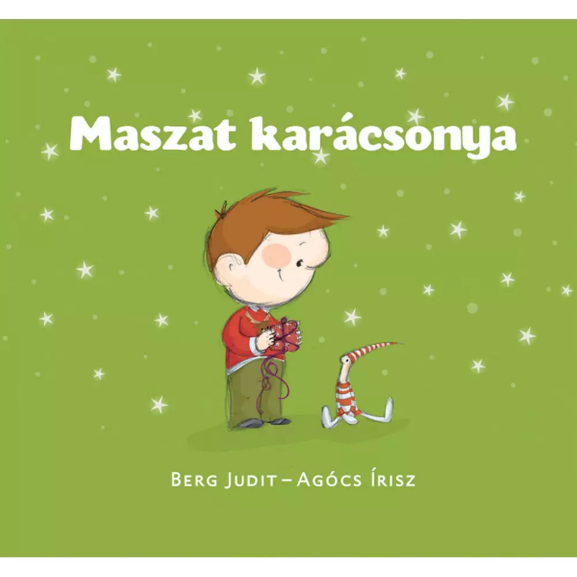 A Maszat karácsonya gyerekkönyv borítója, Berg Judit és Agócs Írisz illusztrációjával. Zöld háttér előtt Maszat piros pulóverben ajándékot csomagol, mellette Hóchóc ül. A csillagokkal díszített borító meghitt, ünnepi hangulatot áraszt.