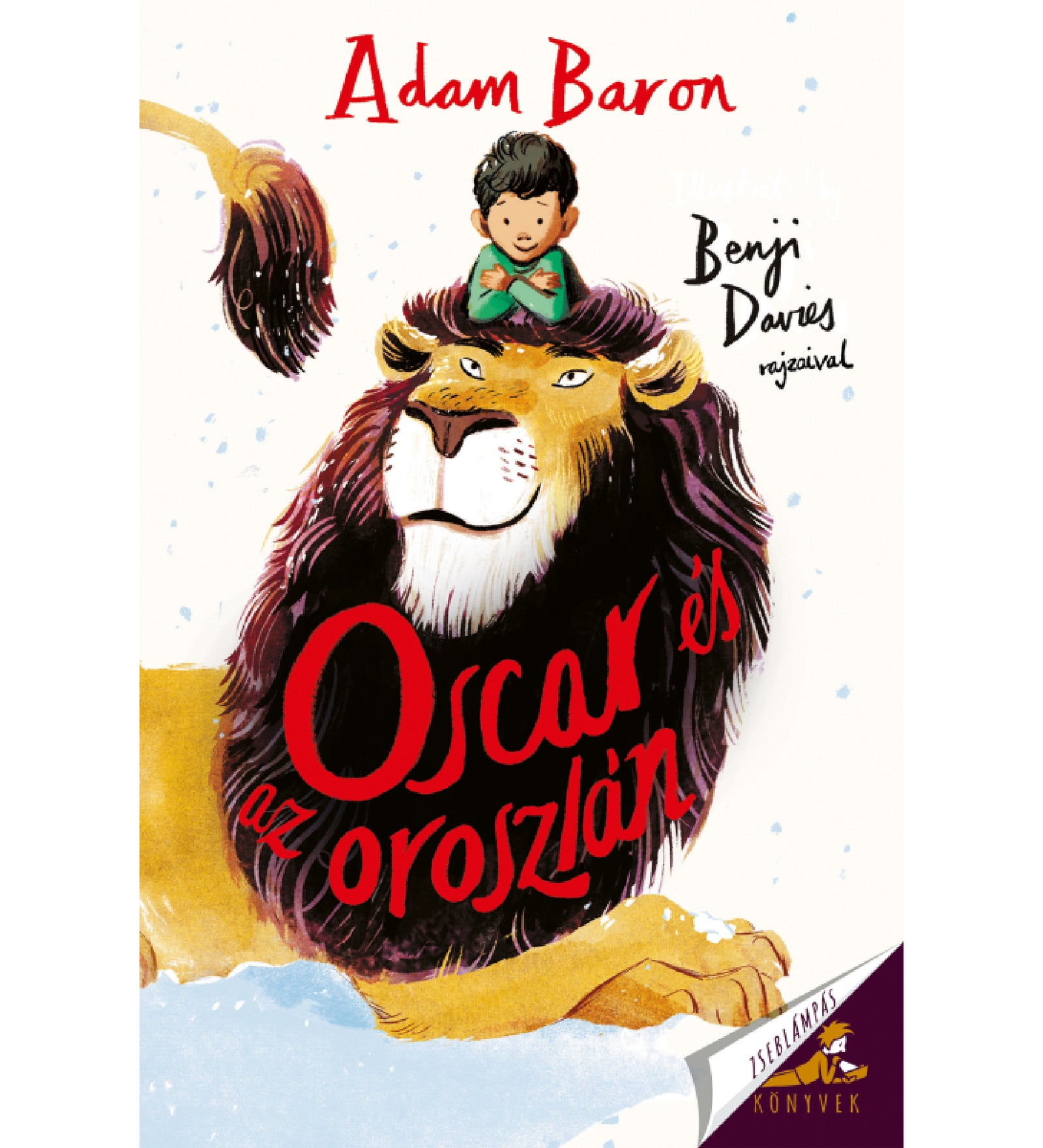 Oscar és az oroszlán című könyv borítója, amelyen egy mosolygó kisfiú ül egy hatalmas, barna sörényű, fekvő oroszlán fején. A háttér világos, havas tájat idéz, a címszöveg piros betűkkel díszíti az oroszlán sörényét. A jobb alsó sarokban a Zseblámpás Könyvek logója látható.