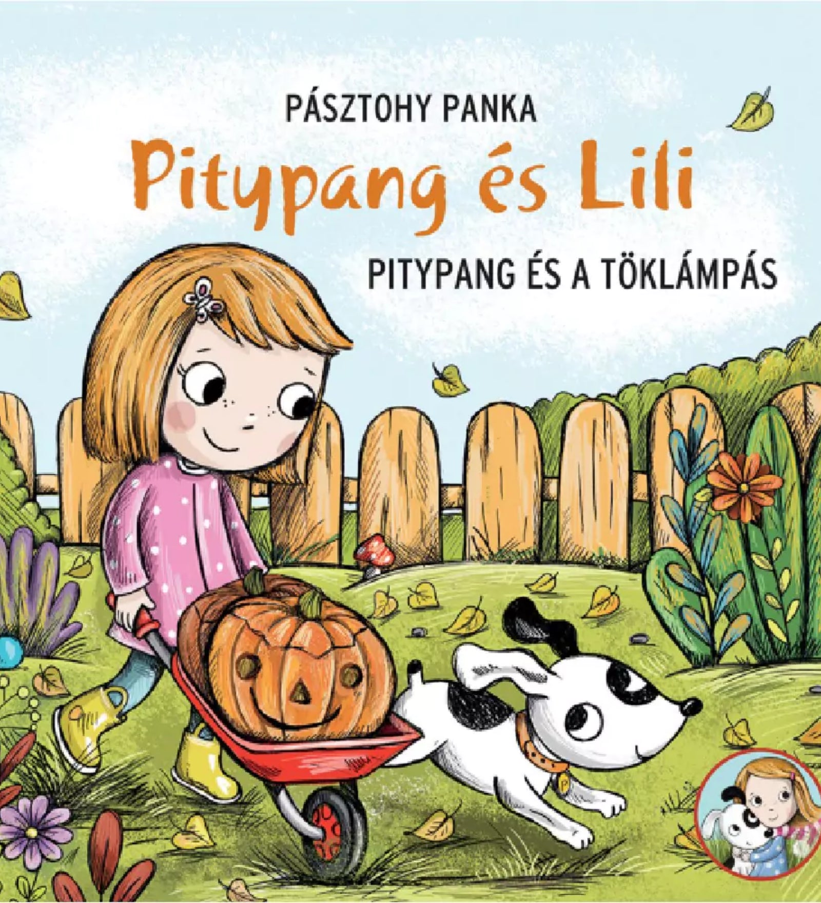 Pitypang és Lili – Pitypang és a töklámpás című magyar nyelvű mesekönyv borítója, Lili talicskában vidám töklámpást tol, mellette ugrándozik Pitypang kutya.