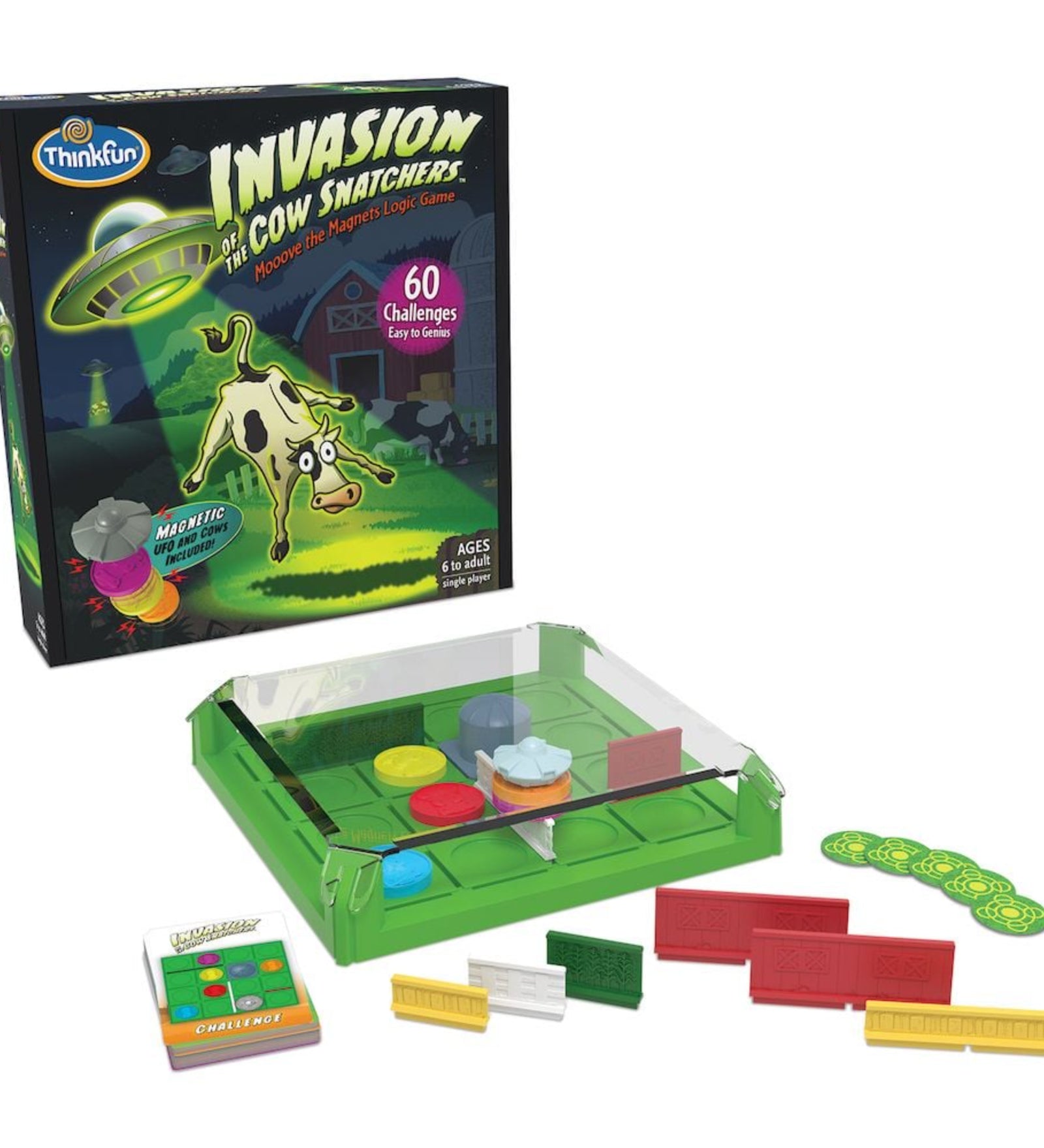 ThinkFun – Invasion of the Cow Snatchers logikai játék doboza és a játék tartalma: zöld játéktábla, mágneses UFO, színes korongok és akadálylapok.