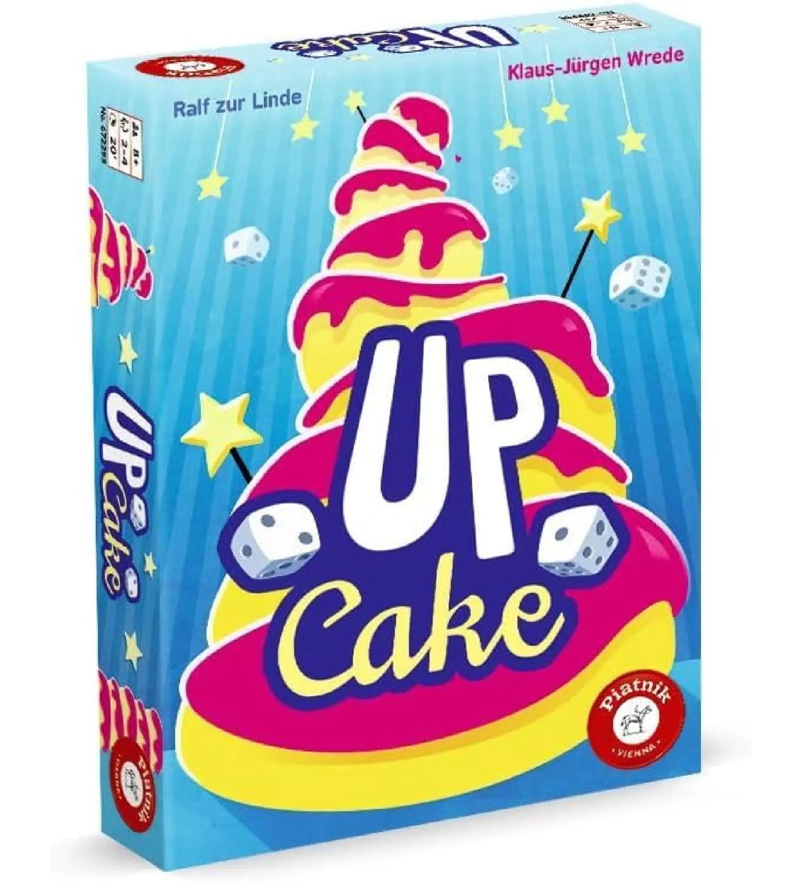 Az Up Cake társasjáték színes, vidám doboza, amely egy emeletes tortát ábrázol csillagokkal és dobókockákkal díszítve.