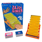 Zajos siker társasjáték doboza és teljes tartalma, sárga zajkeltő pályával, fém golyóval, kártyapaklikkal és színes grafikával, a játék összes tartozékának bemutatásával.