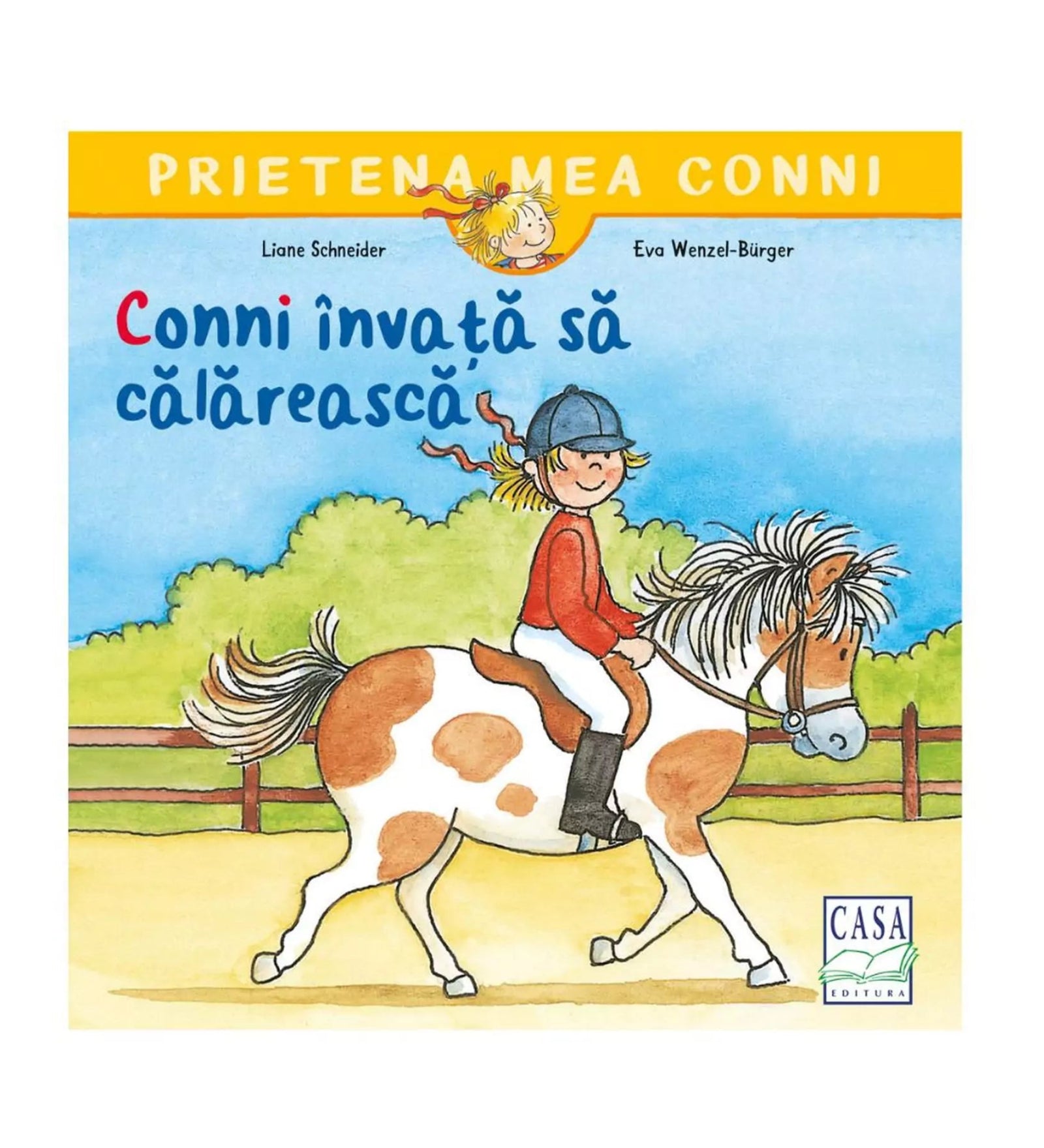 A könyvborítón a „Prietena mea Conni – Conni învață să călărească” című gyerekkönyv látható. A rajzolt illusztráción Conni piros felsőben, kobakban ül egy fehér-barna foltos pónin, miközben lovagol a karámban.