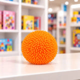 Cool Mix Squishy: Bolyhos tapintású labda 6 cm stresszlevezető játék (Narancssárga)