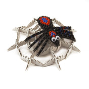 Creagami Origami 3D papírpók figura fekete, piros és kék elemekből, hosszú lábakkal és díszített háttal.