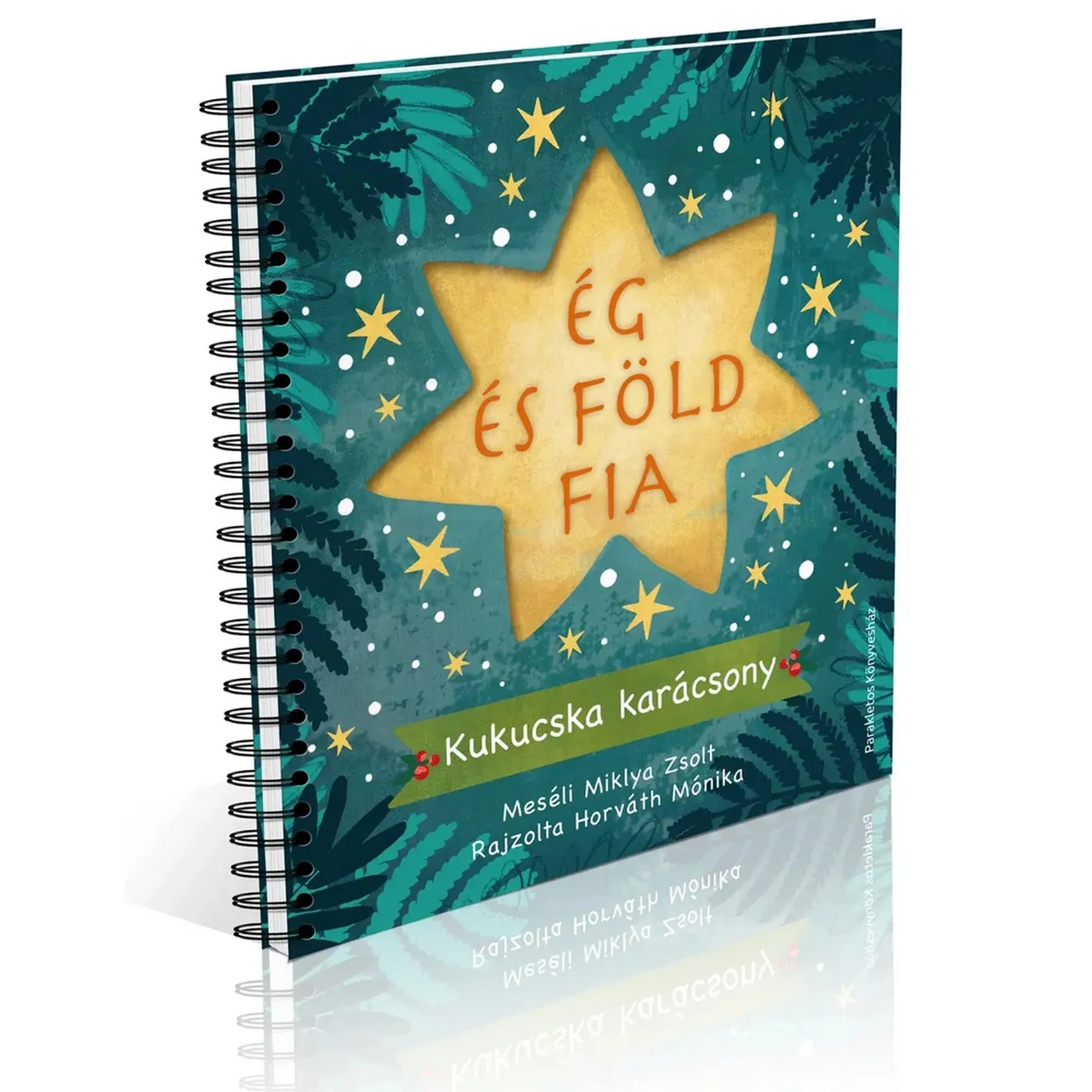 Az Ég és Föld Fia spirálozott mesekönyv borítója csillag alakú díszítéssel és karácsonyi grafikával.