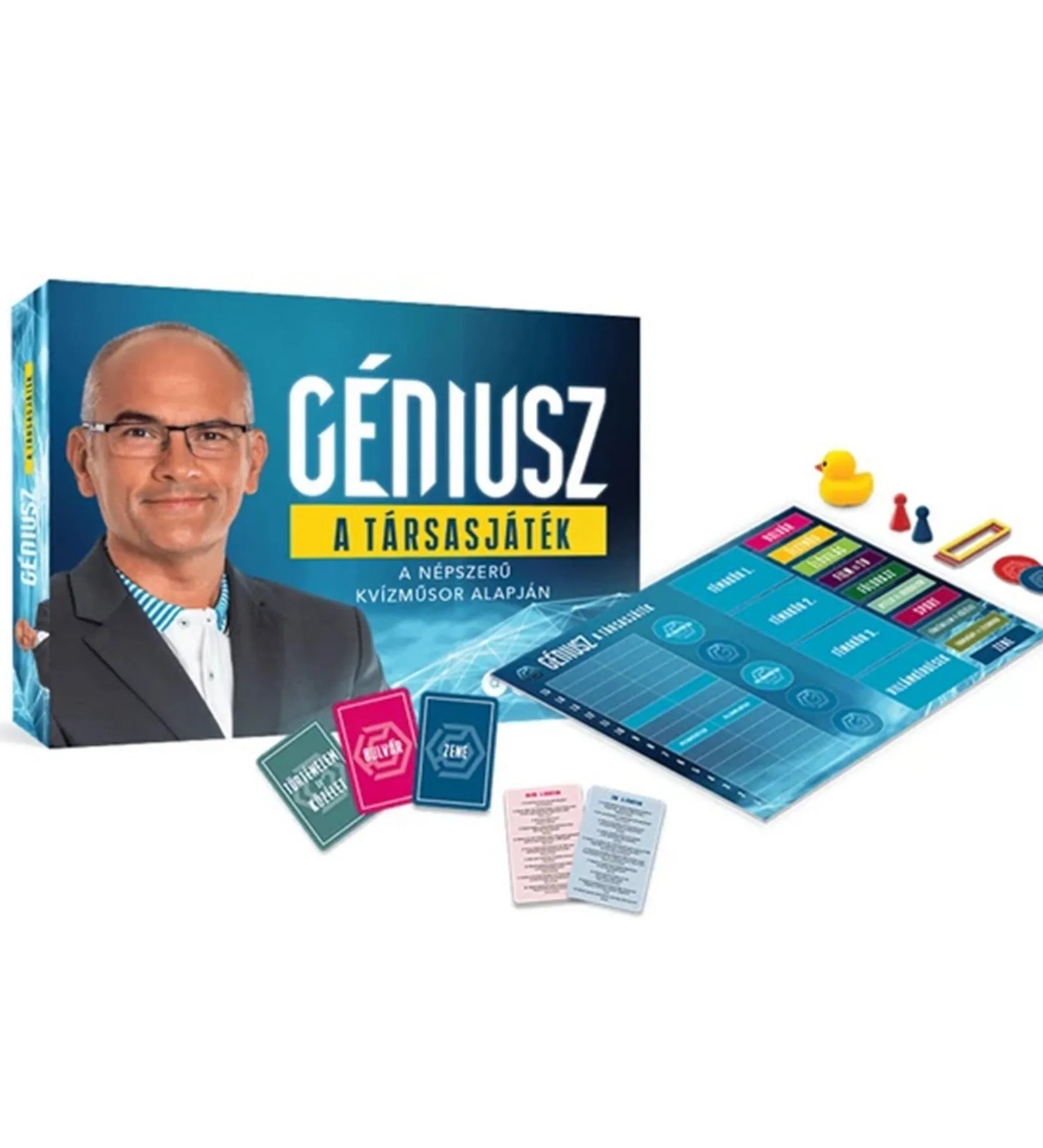 A Géniusz – A társasjáték doboza és tartozékai: kártyák, játéktábla, bábuk, dobókocka és a műsorvezetőt ábrázoló dobozborító. A népszerű televíziós kvízműsor alapján készült társasjáték elemei fehér háttéren.