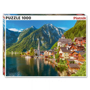 Piatnik Hallstatt Village 1000 darabos puzzle doboza Ausztria híres Hallstatt falujának panorámájával, tóparti házakkal és alpesi hegyekkel.