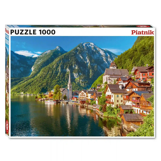 Piatnik Hallstatt Village 1000 darabos puzzle doboza Ausztria híres Hallstatt falujának panorámájával, tóparti házakkal és alpesi hegyekkel.