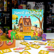 Jancsi és Juliska társasjáték játékelemekkel, édességkártyákkal és színes mézeskalács zsetonokkal