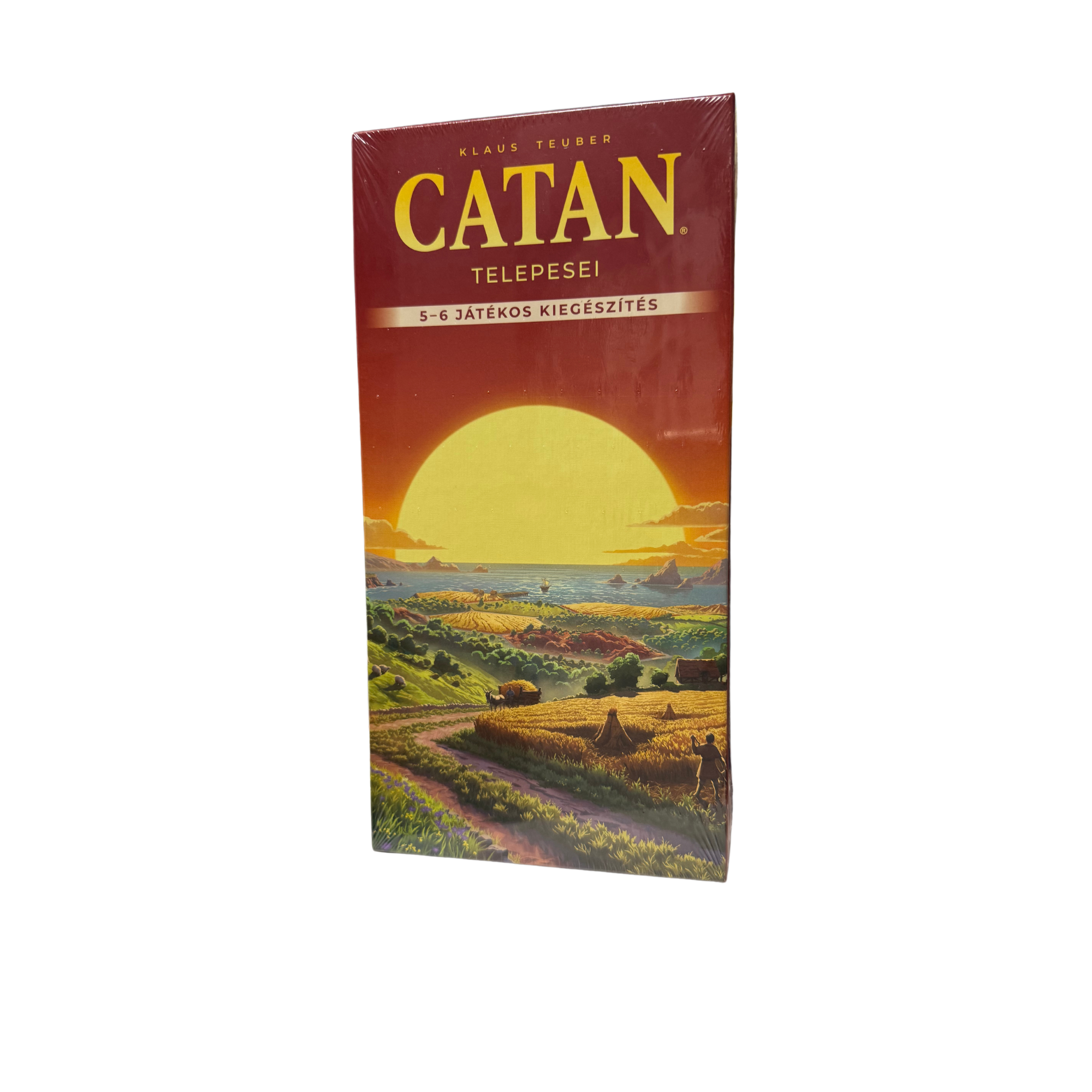 Catan telepesei 5–6 fős kiegészítő doboza, naplementés tájképpel és földműves jelenettel a borítón.