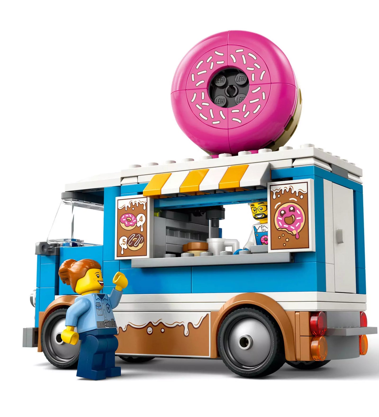 Oldalnézet a LEGO City Fánkárus büfékocsiról (60452), ahol egy eladó és egy vásárló minifigura látható – készen a finom falatok kiszolgálására.