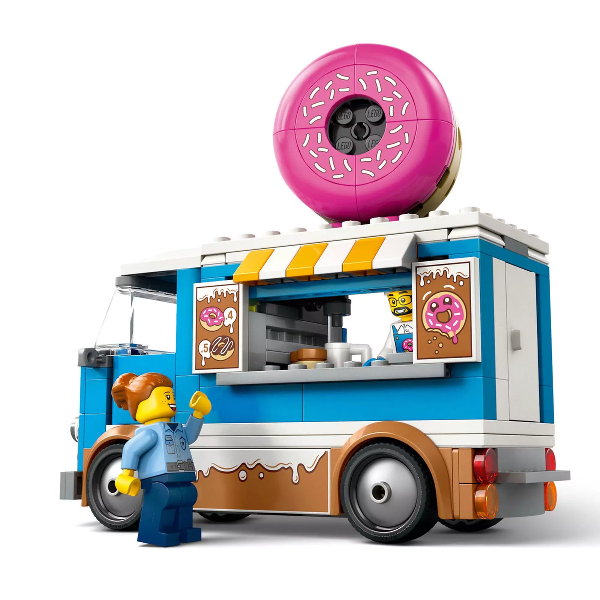 Oldalnézet a LEGO City Fánkárus büfékocsiról (60452), ahol egy eladó és egy vásárló minifigura látható – készen a finom falatok kiszolgálására.
